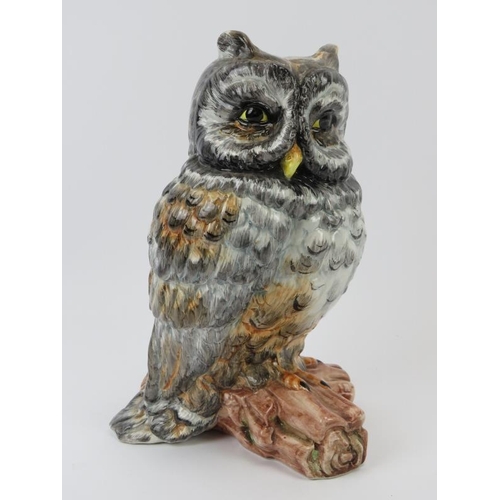 61 - An Italian hand painted ceramic owl, late 20th century. Marked ‘Case Pupo Italy’ beneath. 24.5 cm he... 