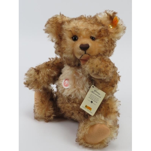 64 - A Steiff ‘Classic Zotty’ mohair teddy bear. Jointed head, arms and legs and a squeaker. Button with ... 