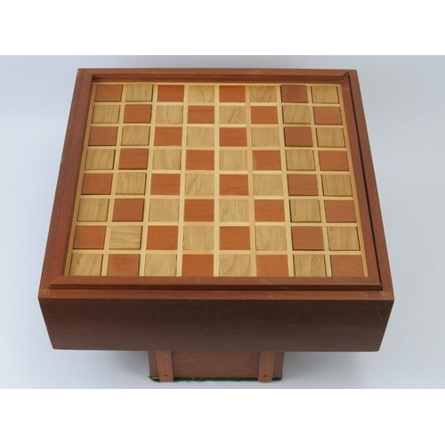 66 - A cherrywood cased chess set and board, late 20th century. With gilt metal chess pieces. The boards ... 