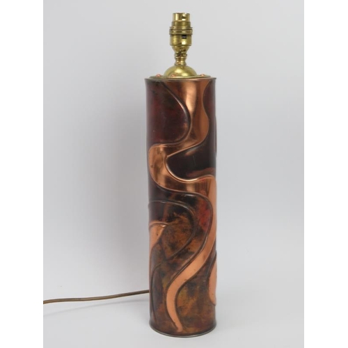 73 - A cylindrical copper table lamp by Sam Fanaroff. Initialled SF beneath. 44.7 cm height. Condition re... 