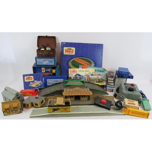 214 - A large quantity of Hornby Dublo 00 gauge railway set accessories including many boxed items. (qty).... 