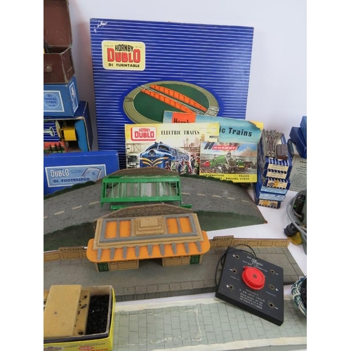 214 - A large quantity of Hornby Dublo 00 gauge railway set accessories including many boxed items. (qty).... 