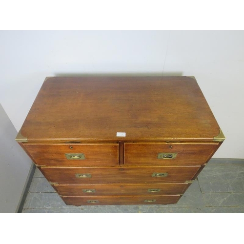 710 - A good 19th century brass mounted teak campaign chest, housing two short and three long drawers with... 