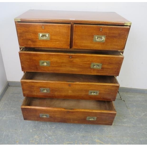 710 - A good 19th century brass mounted teak campaign chest, housing two short and three long drawers with... 