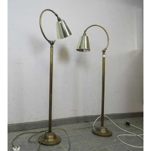 726 - A pair of vintage gilt brass floor-standing reading lamps, with adjustable curved necks, on circular... 