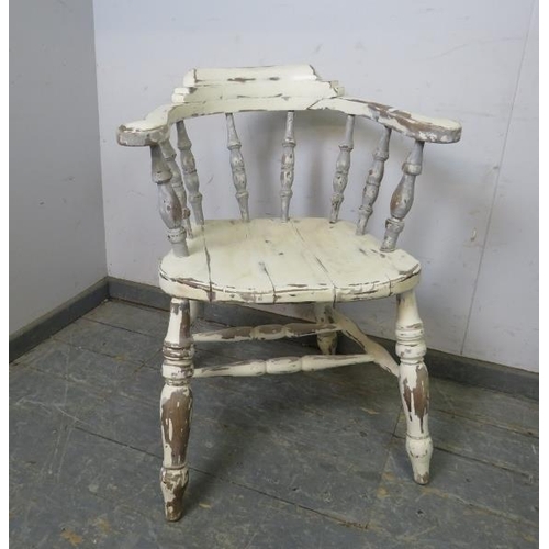 759 - An antique oak captain’s chair painted white and distressed in the Cape Cod style, on turned canted ... 