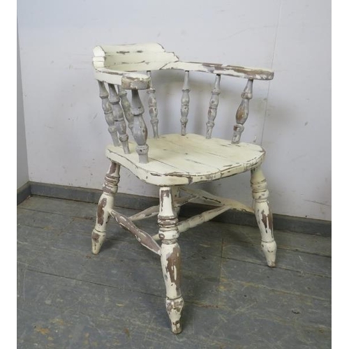 759 - An antique oak captain’s chair painted white and distressed in the Cape Cod style, on turned canted ... 