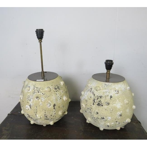 761 - A pair of coastal style pottery table lamps, having height adjustable brass fittings, the bases pain... 