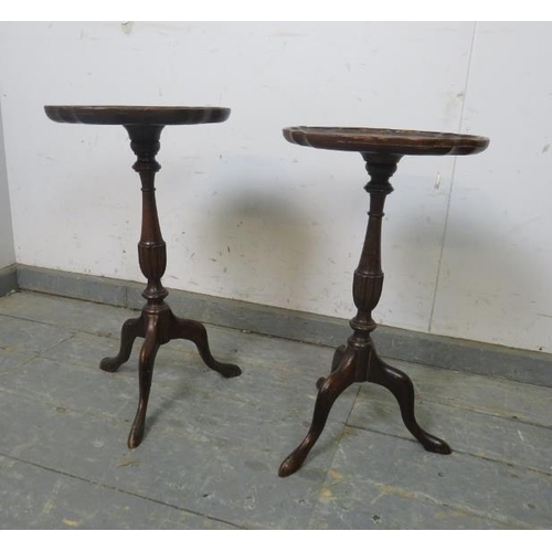 768 - A matched pair of vintage Georgian Revival mahogany wine tables, the tops with piecrust edge and ins... 