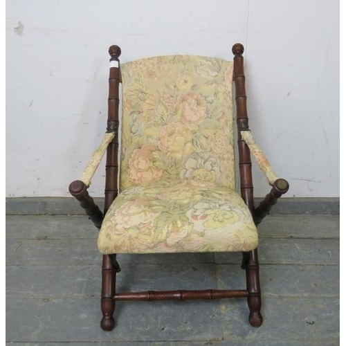 770 - An unusual 19th century child’s folding campaign chair, upholstered in tapestry material, on mahogan... 