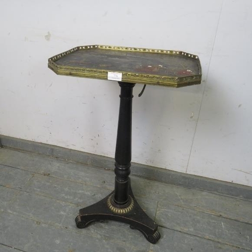 776 - A Regency Period ebonised tilt-top wine table, the top with gilt brass gallery and hand painted Chin... 