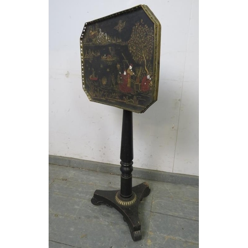 776 - A Regency Period ebonised tilt-top wine table, the top with gilt brass gallery and hand painted Chin... 