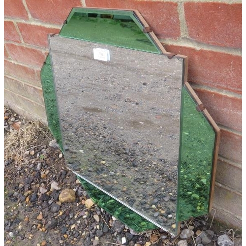 781 - An Art Deco Period square wall mirror, within a sectioned and bevelled green mirrored surround. 
H50... 