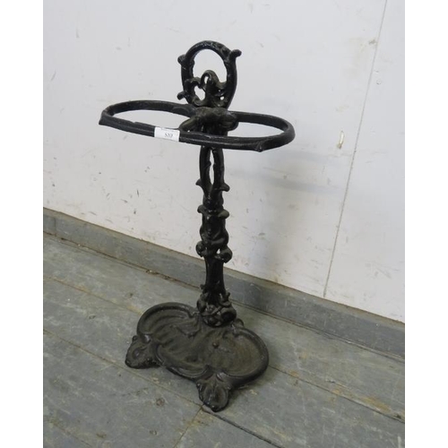 810 - A vintage cast iron stick stand in the 19th century taste painted black. 
H56cm W29cm D19cm (approx)... 