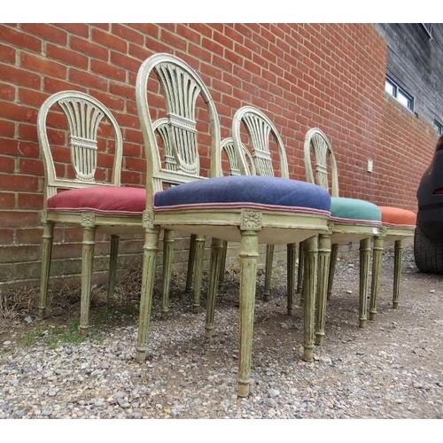 817 - A set of six antique French dining chairs, painted and distressed, the seats upholstered in mismatch... 