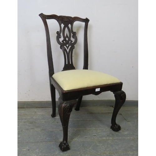 823 - A Georgian mahogany occasional chair, carved in the Chippendale taste, the drop-in seat pad upholste... 