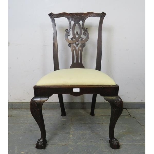 823 - A Georgian mahogany occasional chair, carved in the Chippendale taste, the drop-in seat pad upholste... 