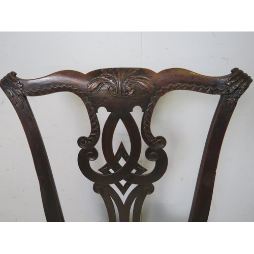 823 - A Georgian mahogany occasional chair, carved in the Chippendale taste, the drop-in seat pad upholste... 