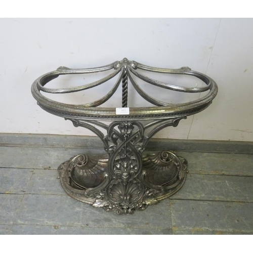 852 - A very ornate cast iron stick stand in the manner of Coalbrookdale, having five divided compartments... 