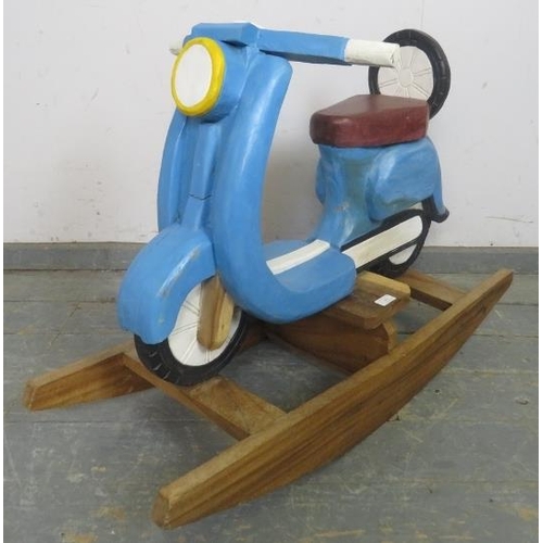 881 - A child’s painted rocking toy modelled as a vintage Lambretta scooter. 
H68cm W97cm D36cm (approx).
... 