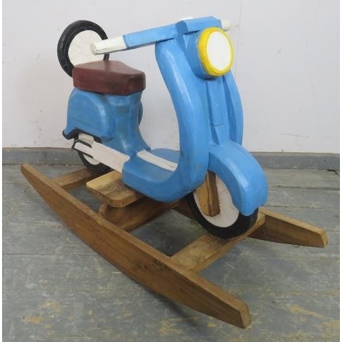 881 - A child’s painted rocking toy modelled as a vintage Lambretta scooter. 
H68cm W97cm D36cm (approx).
... 