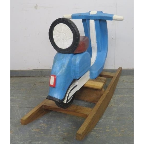 881 - A child’s painted rocking toy modelled as a vintage Lambretta scooter. 
H68cm W97cm D36cm (approx).
... 