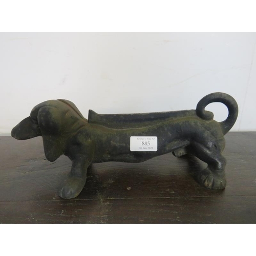 885 - A cast iron boot-scraper modelled as a dachshund. 
L33cm (approx).
Condition report: No issues.