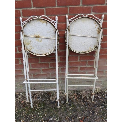 890 - A pair of heavy folding metal outdoor bar stools, the backrests with pierced pineapple decoration. 
... 