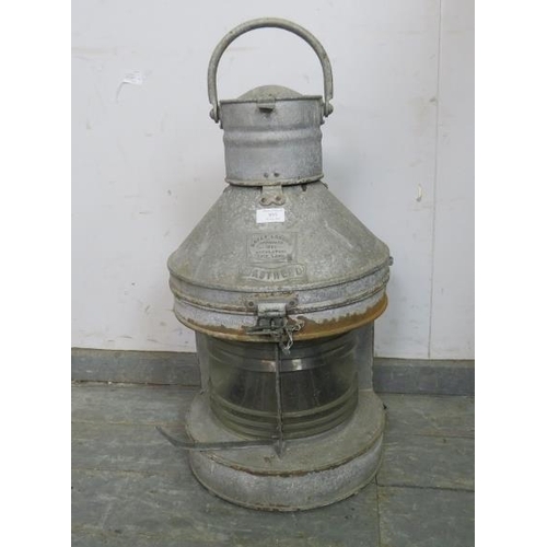 895 - A large antique galvanised ship’s masthead lantern, complete with internal burner and fittings.
H70c... 