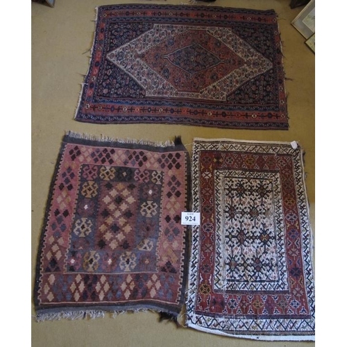 924 - Three early mid 20th Century Kilim rugs, one pink and brown 94 x 82cms, one cream and red 102 x 67cm... 