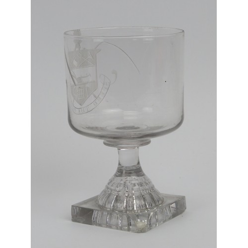 93 - A Georgian period English engraved glass rummer, early 19th century. With moulded square feet and en... 