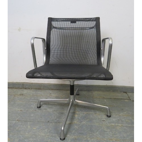 841 - An EA108 Charles Eames swivel desk chair by Vitra, the black cast aluminium frame with black mesh se... 