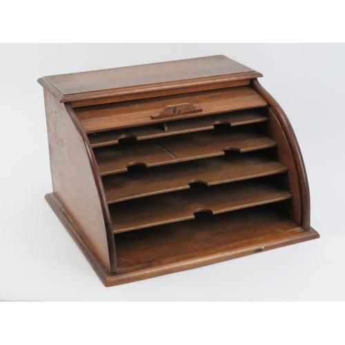 113 - A mahogany desk letter rack with tambour front cover, early 20th century. 31.7 cm width, 19.5 cm hei... 