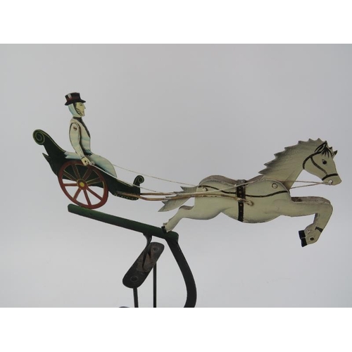 116 - A vintage Folk Art pony and trap painted metal pendulum balance toy. 42.2 cm height. Condition repor... 