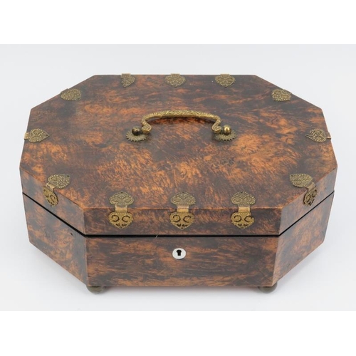 16 - A French musical sewing box, 19th century. Of elongated octagonal form, the hinged cover opening to ... 