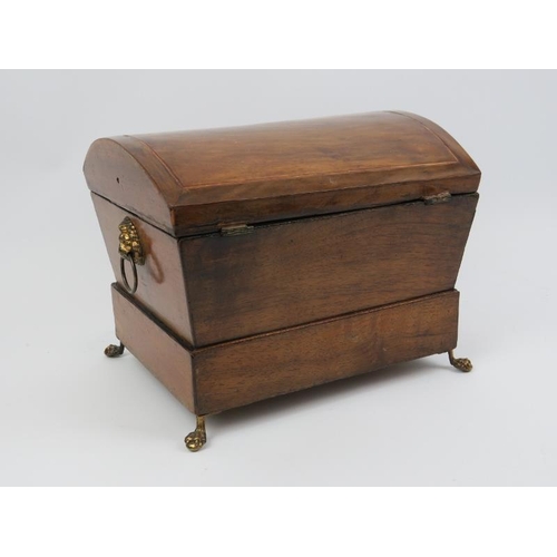 17 - A Regency box strung mahogany sewing box. Of sarcophagus form with a hinged cover, lower external dr... 