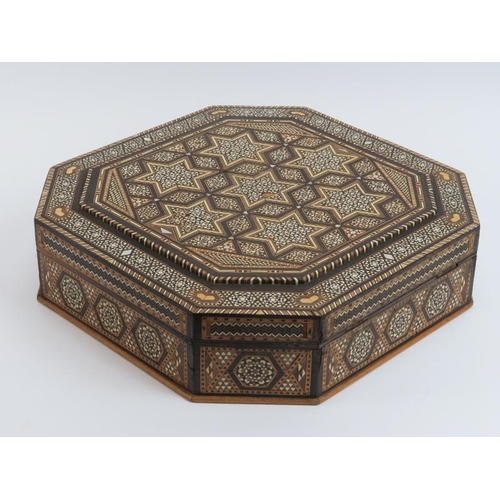 20 - A large Islamic parquetry inlaid wood, ivorine and mother of pearl box, 20th century. Of octagonal f... 