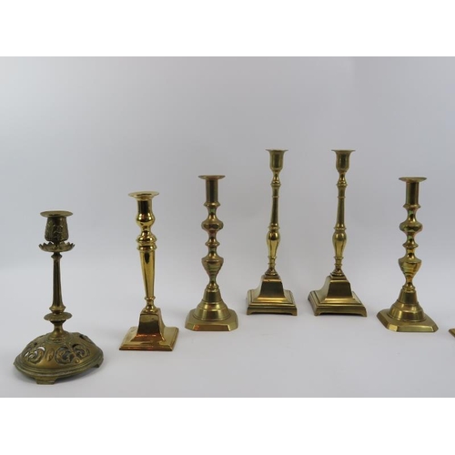 21 - Four pairs of antique brass candlesticks, 19th century. (4 items) 31.3 cm tallest height. CR: Some a... 