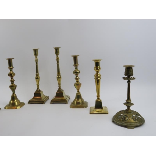 21 - Four pairs of antique brass candlesticks, 19th century. (4 items) 31.3 cm tallest height. CR: Some a... 