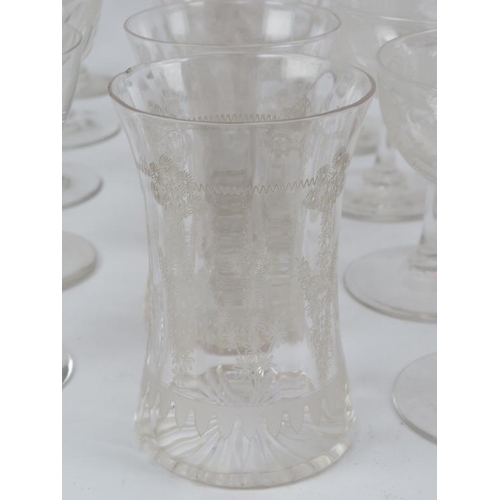 259 - A group of sixty clear glass drinking glasses. (60 items) tallest height. 
Condition report: The maj... 