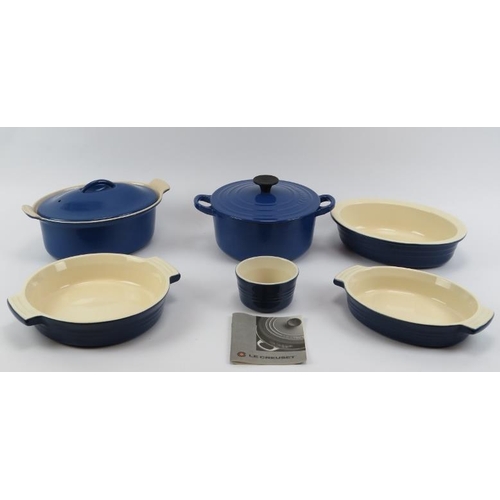 269 - A group of six French Le Creuset ceramic wares. Items include a casserole with cover, tureen with co... 