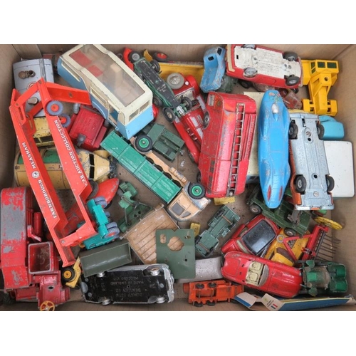 274 - A large collection of vintage toys. Items include a quantity of Dinky die-cast vehicles including a ... 