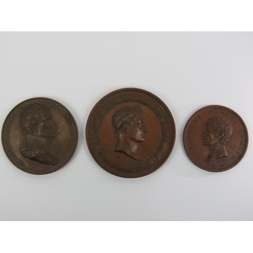 281 - A group of three French Napoleonic commemorative bronze medals, early/mid 19th century. The larger b... 