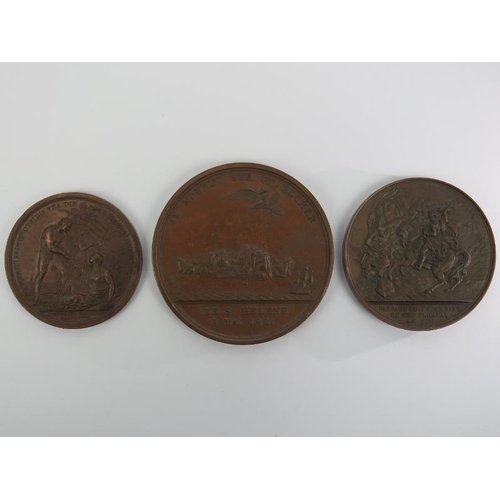 281 - A group of three French Napoleonic commemorative bronze medals, early/mid 19th century. The larger b... 