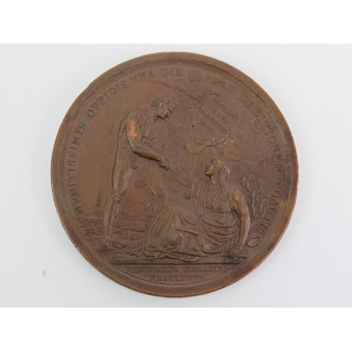 281 - A group of three French Napoleonic commemorative bronze medals, early/mid 19th century. The larger b... 