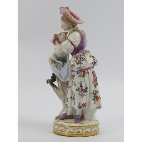 38 - A Meissen hand painted porcelain figure of a shepherdess, 19th century. Factory marks beneath. 18.5 ... 