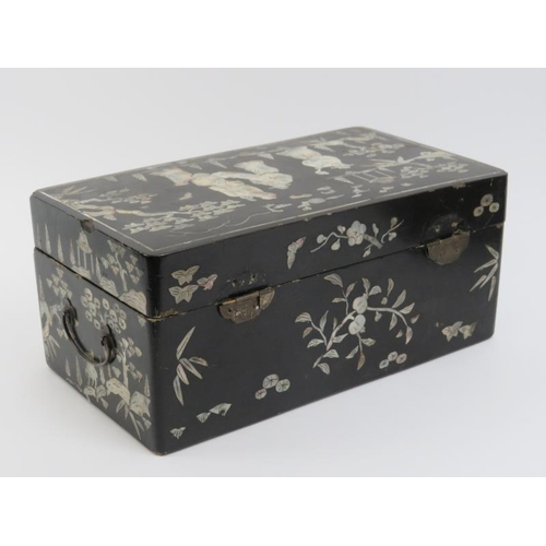 41 - A Chinese black lacquered mother of pearl inlaid box and two boxes inset with carved jade plaques, e... 