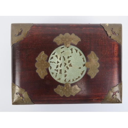 41 - A Chinese black lacquered mother of pearl inlaid box and two boxes inset with carved jade plaques, e... 