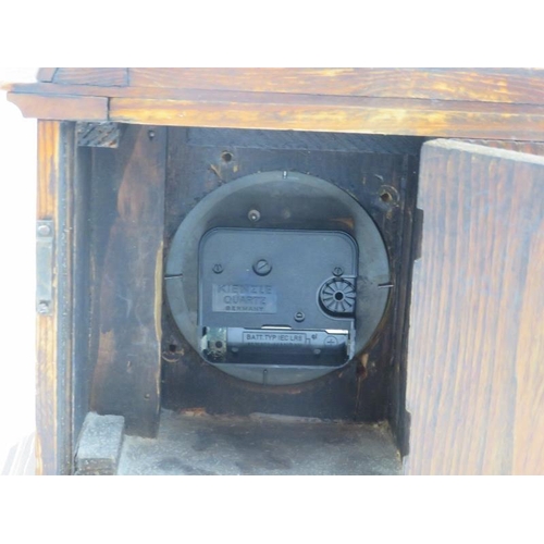 42 - A Victorian oak combined mantel clock and aneroid barometer. 29.3 cm length. Condition report: Some ... 