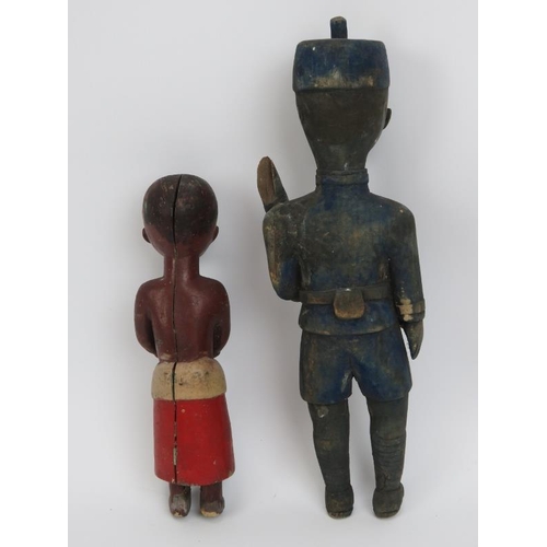 50 - Two African painted wood figural carvings, probably late 19th/early 20th century. Comprising a figur... 